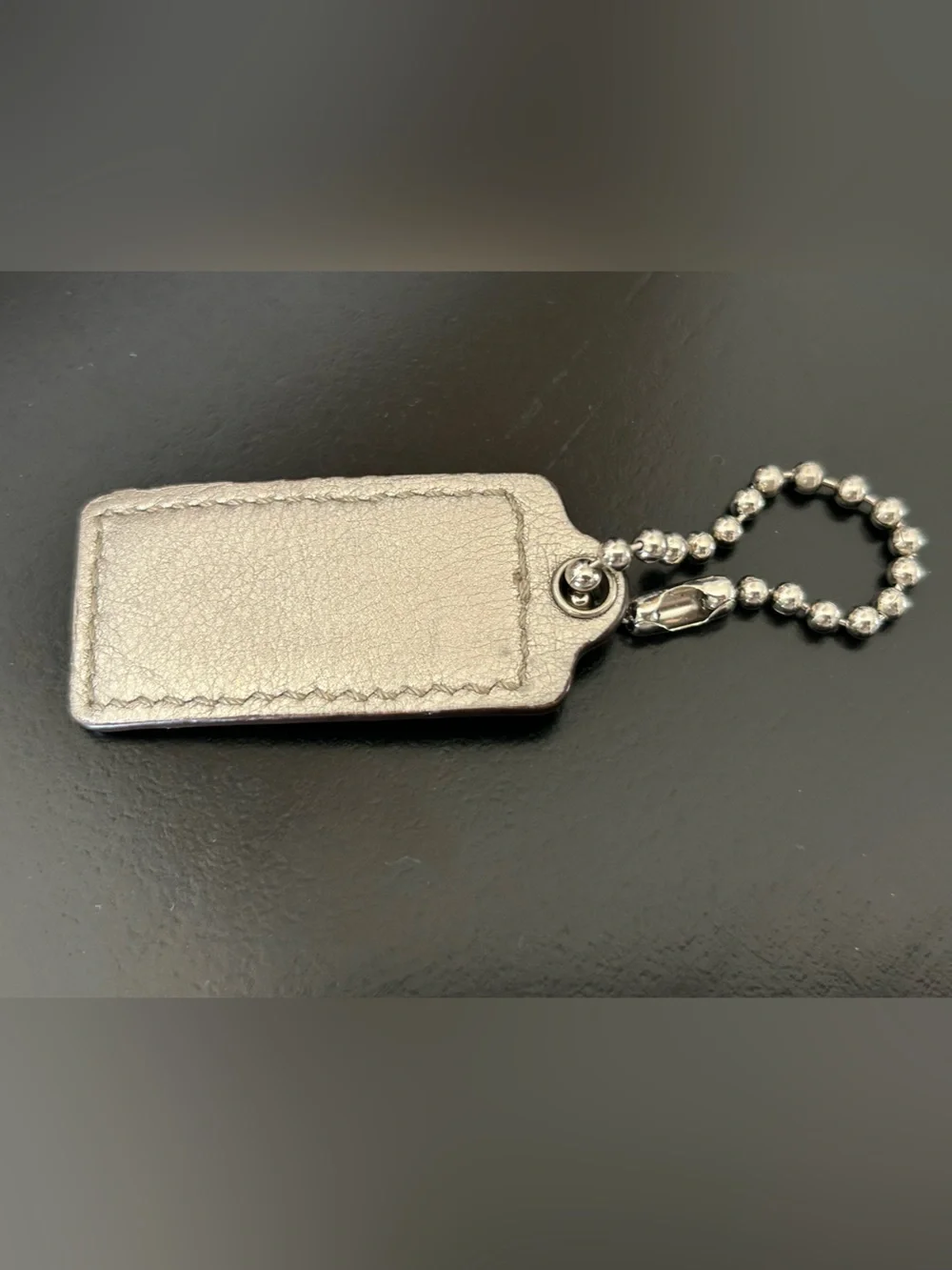 COACH Metallic Gold Leather Hang Tag